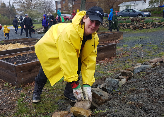 Sobeys employee planting a garden 
