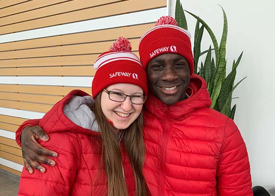 Two Safeway employees standing together in the Sobeys Corporate Office.