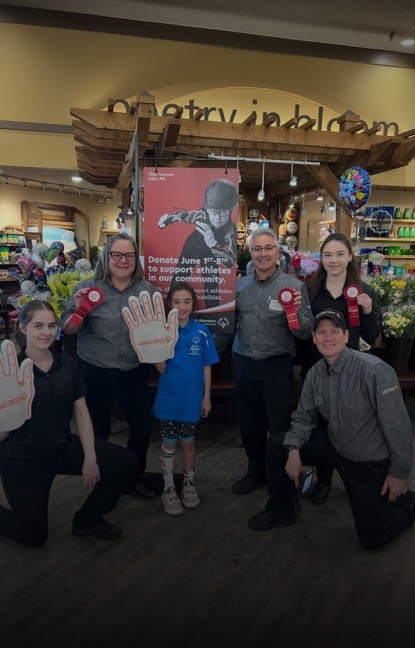 A group of people clicking the picture together with holding some props in their hand